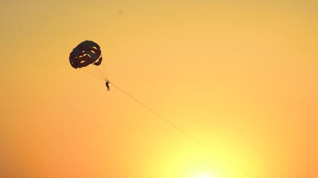 Tourist Paragliding at Sunset During Rann Utsav, Rann of Kutch