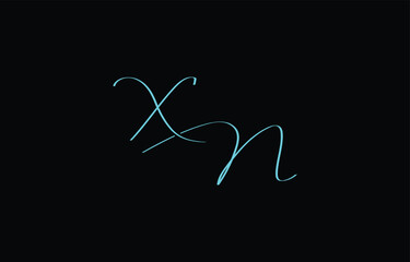 A minimal yet stylish depiction of white cursive lettering forming XN on a dark background, symbolizing elegance and simplicity.