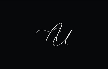 A minimal yet stylish depiction of white cursive lettering forming AU on a dark background, symbolizing elegance and simplicity.