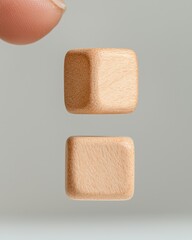 Floating wooden block manipulation minimalist studio neutral background close-up unique perspective