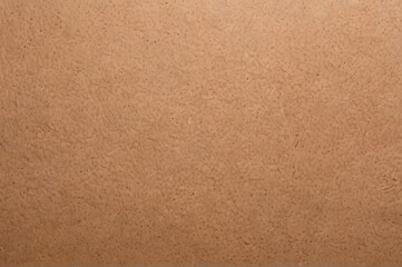 Fototapeta premium Textured beige surface featuring subtle variations in color, ideal for backgrounds and design applications