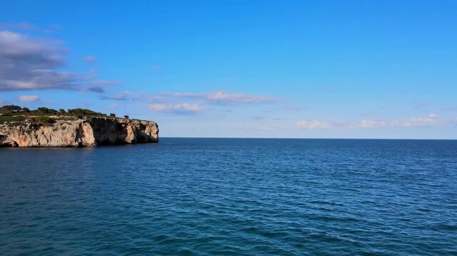 Experience the serene beauty of Cala Varques in Porto Cristo, Majorca. The tranquil waters and stunning cliffs offer a perfect escape for relaxation and exploration.