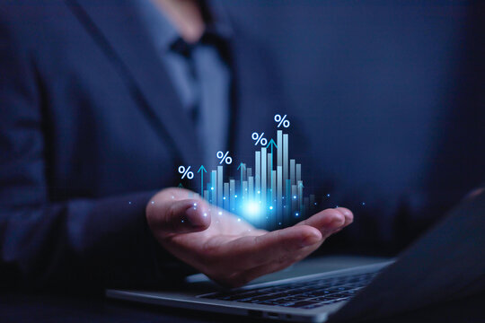 Interest rate and mortgage rates concept. Businessman showing percentage graph and the rate increases, Mortgage interest rate growth, increasing interest, percent