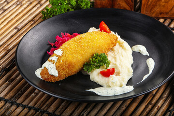 Chicken Kiev cutlet with puree