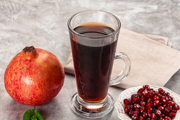 Sweet fresh pomegranate juice with fruit