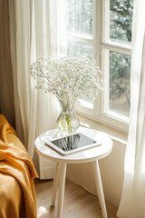 top view product closeup, from top to bottom, tablet on small white side table