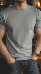 A man wearing grey color t shirt mockup; with bracelet; at the cafe; front view
