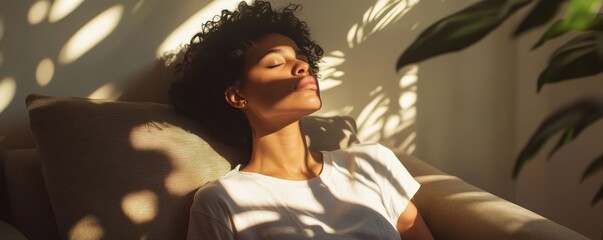 Fototapeta premium Woman Relaxing in Sunlit Room
