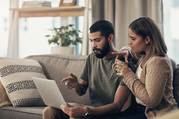 Pointing, online and couple with laptop, home and planning for budget in living room and newlyweds....