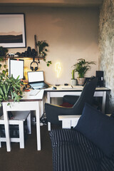 Empty, office and laptop on furniture, screen and equipment for setup in workstation, mockup or architecture. Creative, interior and design of room for business, display or monitor on table or vacant