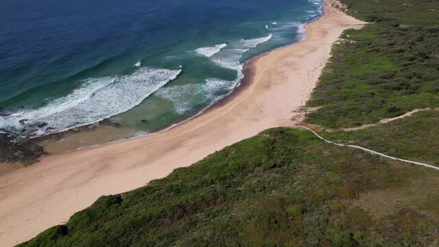 Ocean Waves Splashing At Glenrock Beach In New South Wales, Australia - Aerial Shot
