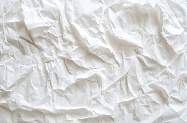 Obraz premium A blank beige paper texture with subtle grain, perfect for adding design elements or text. The background is uniform in color and has no patterns, uncluttered canvas to display your content.