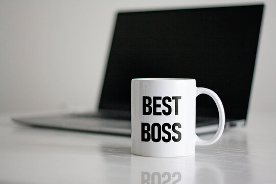A coffee cup with best boss ever written on it