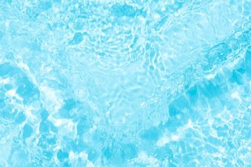 Blue water with ripples on the surface. Defocus blurred transparent blue colored clear calm water...