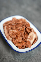 Fried banana chips. Crispy banana chips. Thai fruit snack