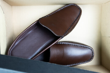 New a pair of brown loafers in box. Men casual leather shoes