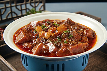 Spicy red oil braised pork tendon with rice noodle soup