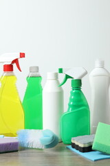 Many different cleaning products on the table