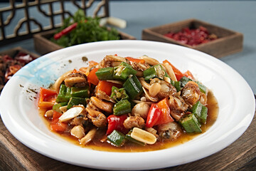 Braised scallops with bell pepper, okra, seafood and mushrooms