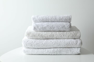 Stack of bath towels on the table