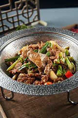 Braised beef with garlic, garlic sprouts, rice and pepper