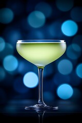 Close up of Sleek Crystal Cocktail Glass with Long Island Iced Tea Drink on Dark Minimalist Background