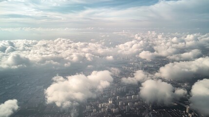 Fototapeta premium Aerial view city skyline, clouds, urban sprawl, flight, travel