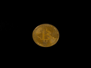 A gold coin with the letter B on it
