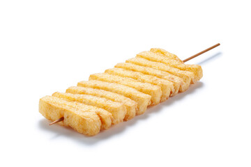Deep fried tofu with bamboo stick on white background, Chinese traditional snacks