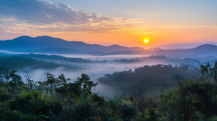 Obraz premium Breathtaking sunrise over misty mountains, showcasing vibrant colors and serene landscapes. tranquil atmosphere invites reflection and appreciation of nature beauty