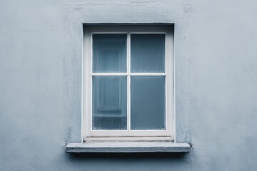 Fototapeta premium White framed window on light blue painted concrete wall