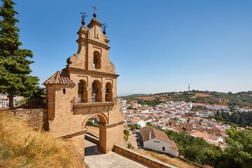 Fototapeta premium Picturesque andalusaian village of Aracena. Bell tower castle entrance. Spain