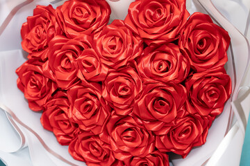 Heart-shaped arrangement of red roses for special occasions