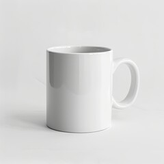 Obraz premium A plain white coffee mug isolated on white background, suitable for beverages or branding.