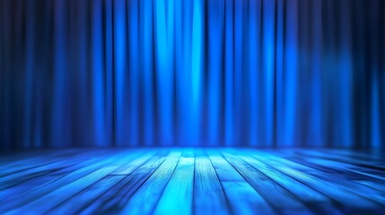 a stage with blue curtains and a wooden floor, illuminated by blue lighting, suggesting a theater or performance setup.