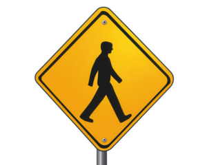 pedestrian overpass sign indicating safe crossing for walkers. This bright yellow sign promotes safety and awareness for pedestrians in urban areas