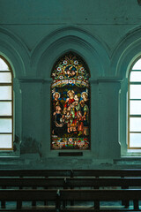 Colorful stained glass window in an old church