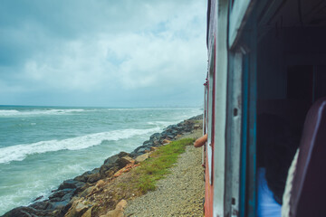 A seaside city and train located in Sri Lanka.