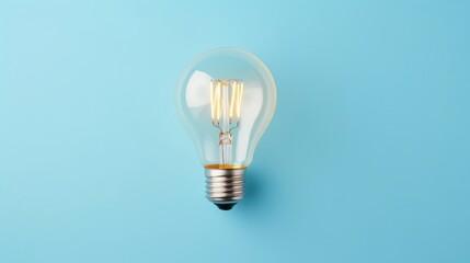 Light bulb on blue background. Concept of idea, innovation and creativity.