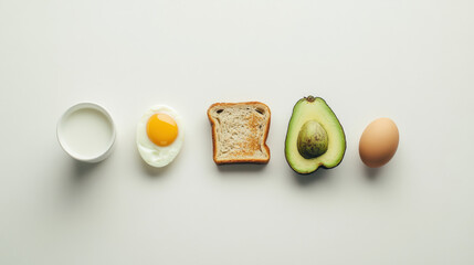 flat lay of breakfast spread featuring soy milk, fried egg, toast, avocado, and whole egg, creating healthy and balanced meal