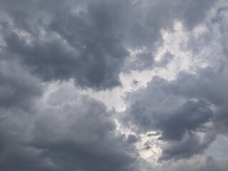 Fototapeta premium Dramatic dark clouds, Strom and strong wind. Bad weather in rainy season. Natural texture background 