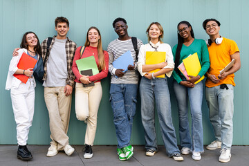 A diverse group of friends in casual attire enjoying school supplies and educational activities
