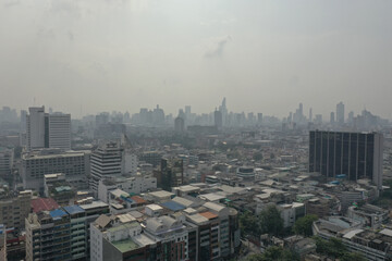 Fototapeta premium It is DUST in the Air in 2019, the Air Pollution of PM2.5 of the suburbs stretching to the big city. which was shrouded in dirty dust and the sky was wide with gigantic clouds.