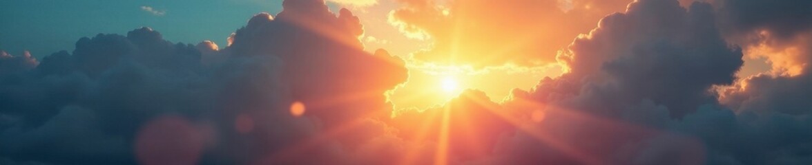 Dramatic clouds, divine sun rays pierce heavy sky, illumination, spiritual