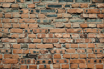brick wall made of old brown bricks close up