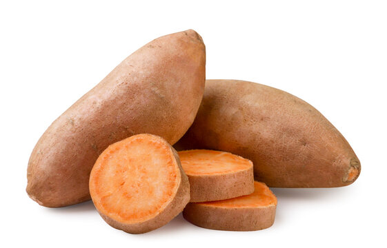 Sweet potato and pieces on a white background. Isolated,