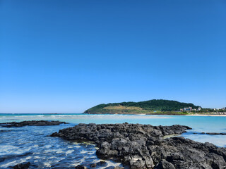 A view of the sea and granite in Jeju Island, Korea