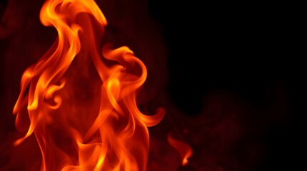 Dramatic Flames Dancing Against a Black Background Emitting Warmth and Energy