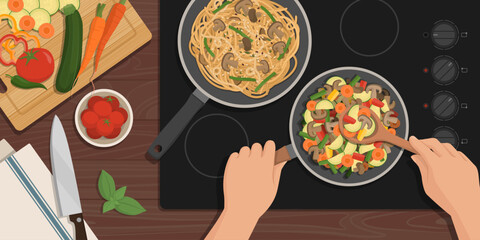 Cook frying vegetables in a pan top view