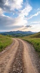 Winding dirt road through hills, scenic sunset. Travel photography